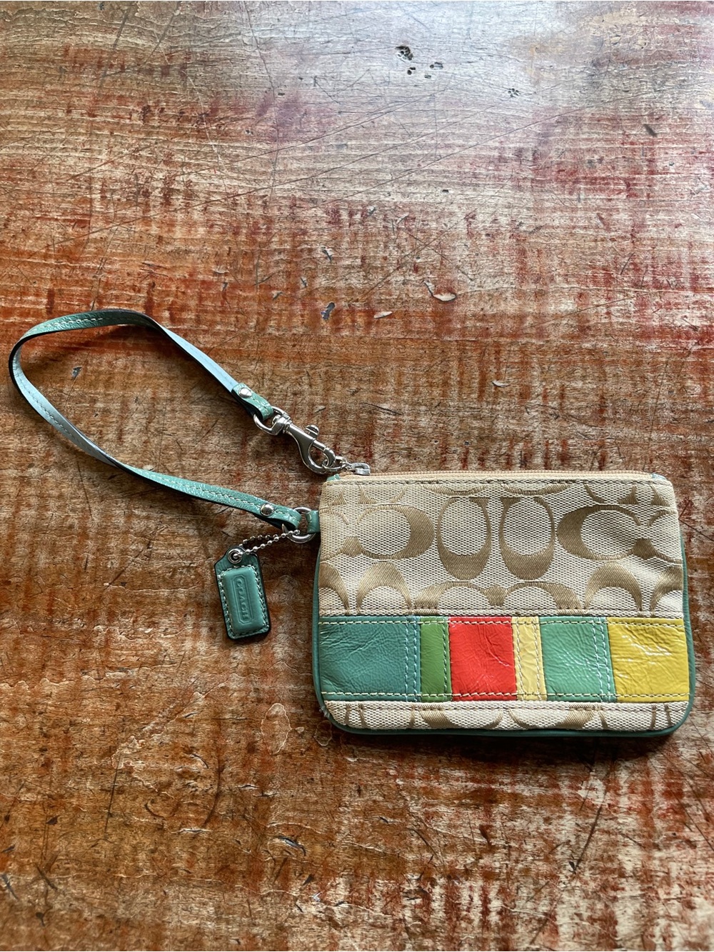 Coach Beige Signature Wristlet with Teal, Red, Yellow & Green Accents